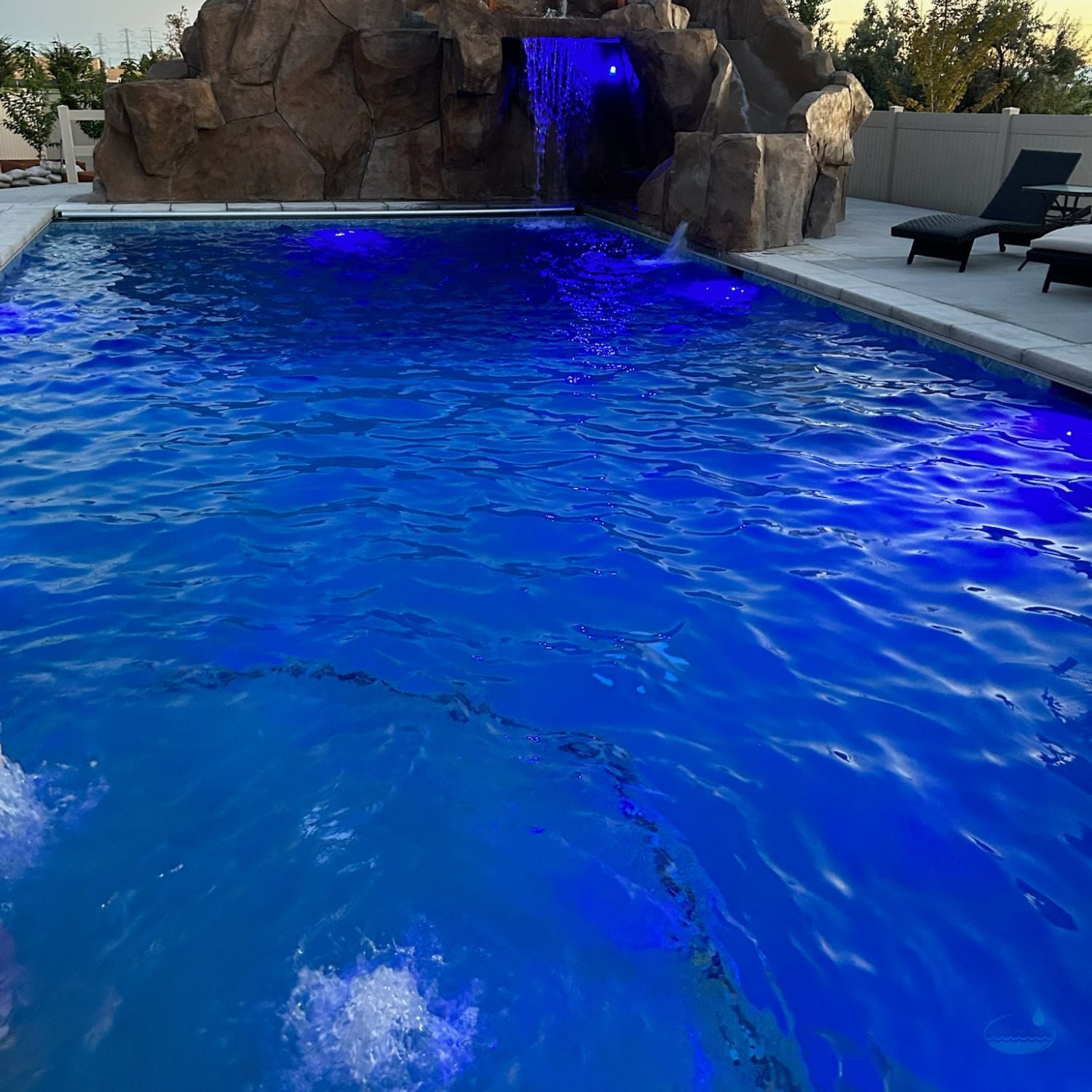 Deck Jets and Water Effects That Enhance Nighttime Use for A Pool and Spa